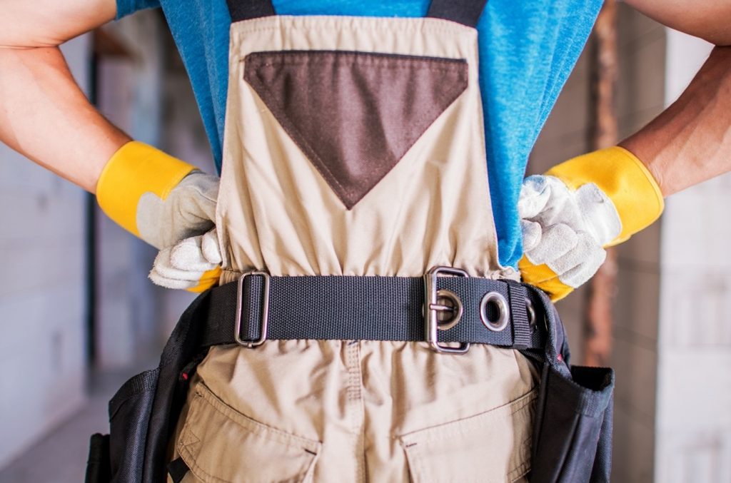 prefered contractor standing with work belt