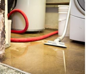 Water damage in a basement from water tank leak