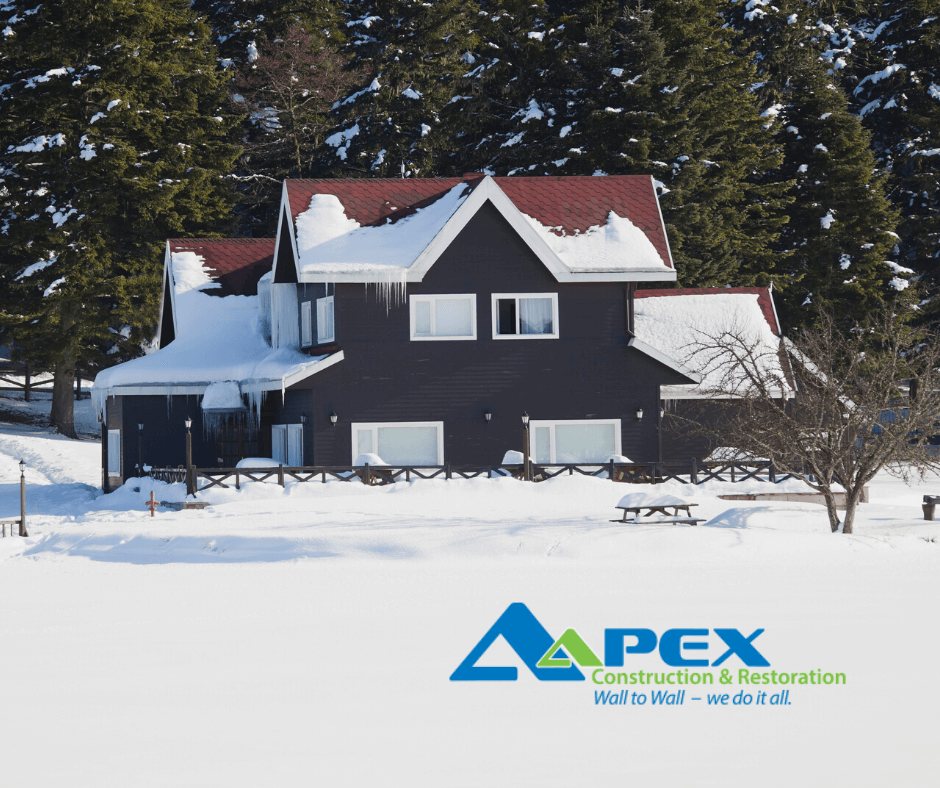 Home in winter with a new roof covered in snow