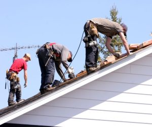 A team doing a roof replacement job.