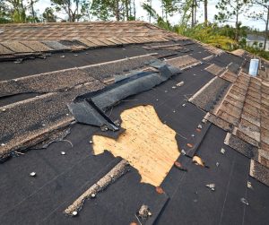 A damaged roof that needs repairing.