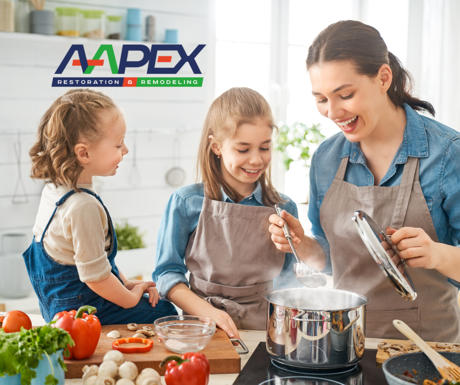 A woman and two children preparing meal in a trendy kitchen. Aapex logo top left.