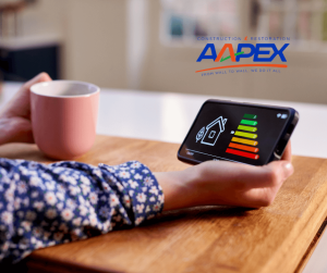 Person Drinking Coffee and Checking Phone For Energy Saving Status - Aapex Logo Top Right