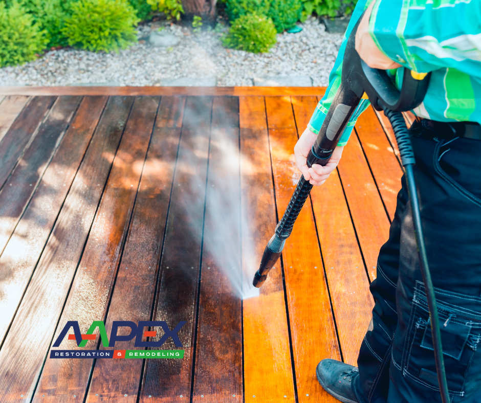 Power washing deck boards.